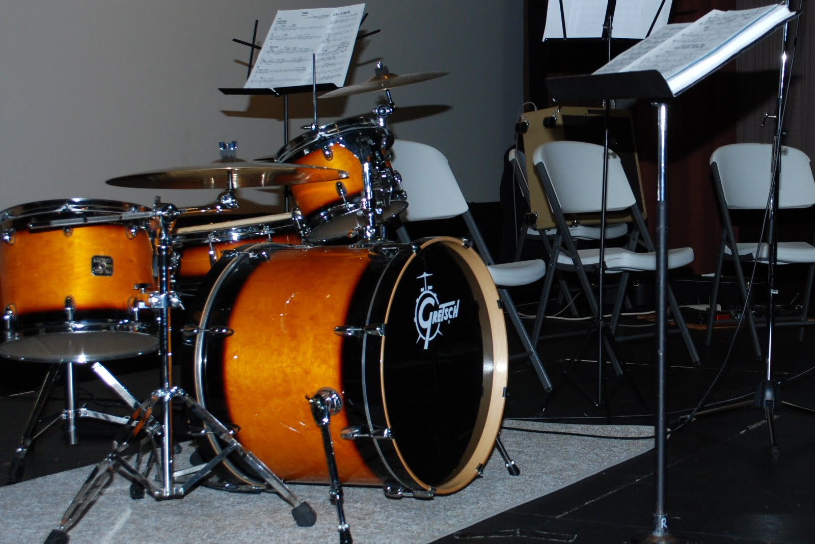 An empty stage set for the evening's performances, RecWest Auditorium