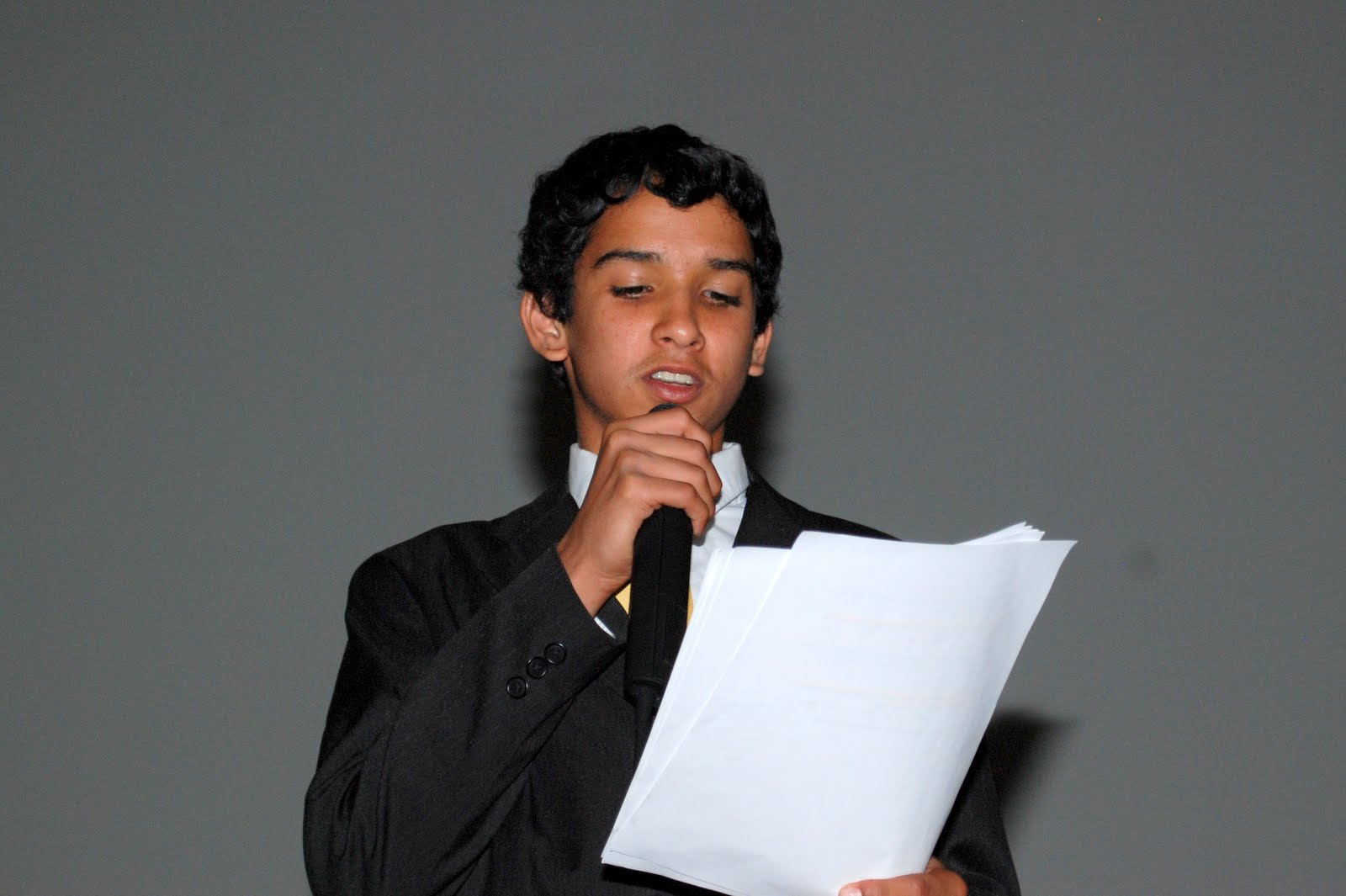 A young performer reading from sheet music