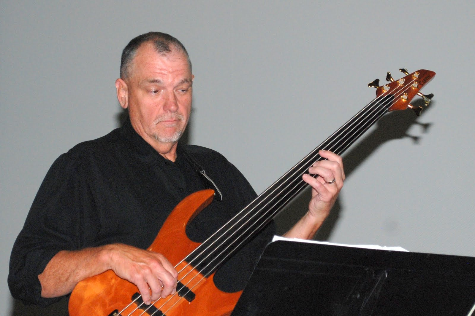 A bassist performing