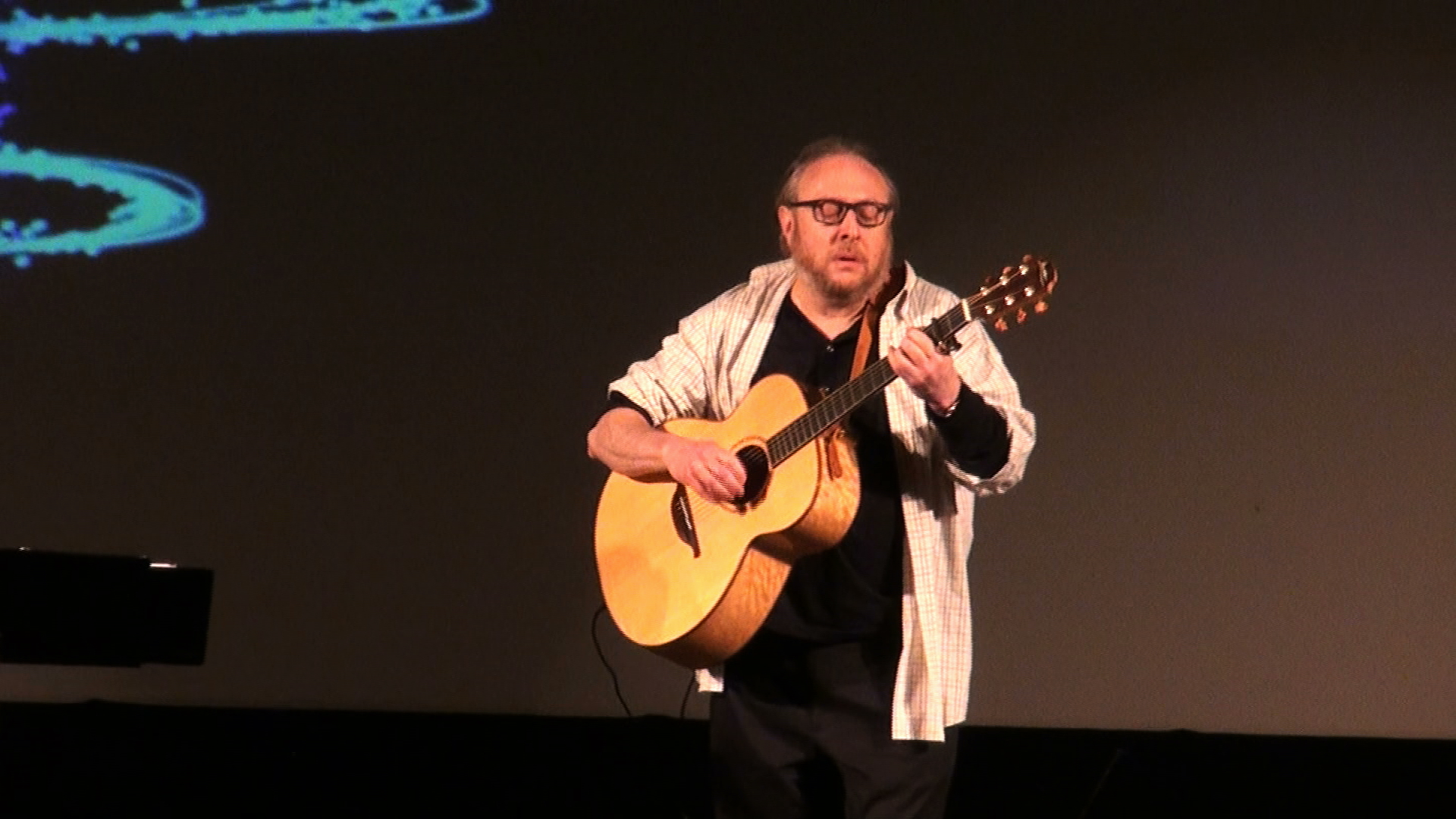 A man playing guitar