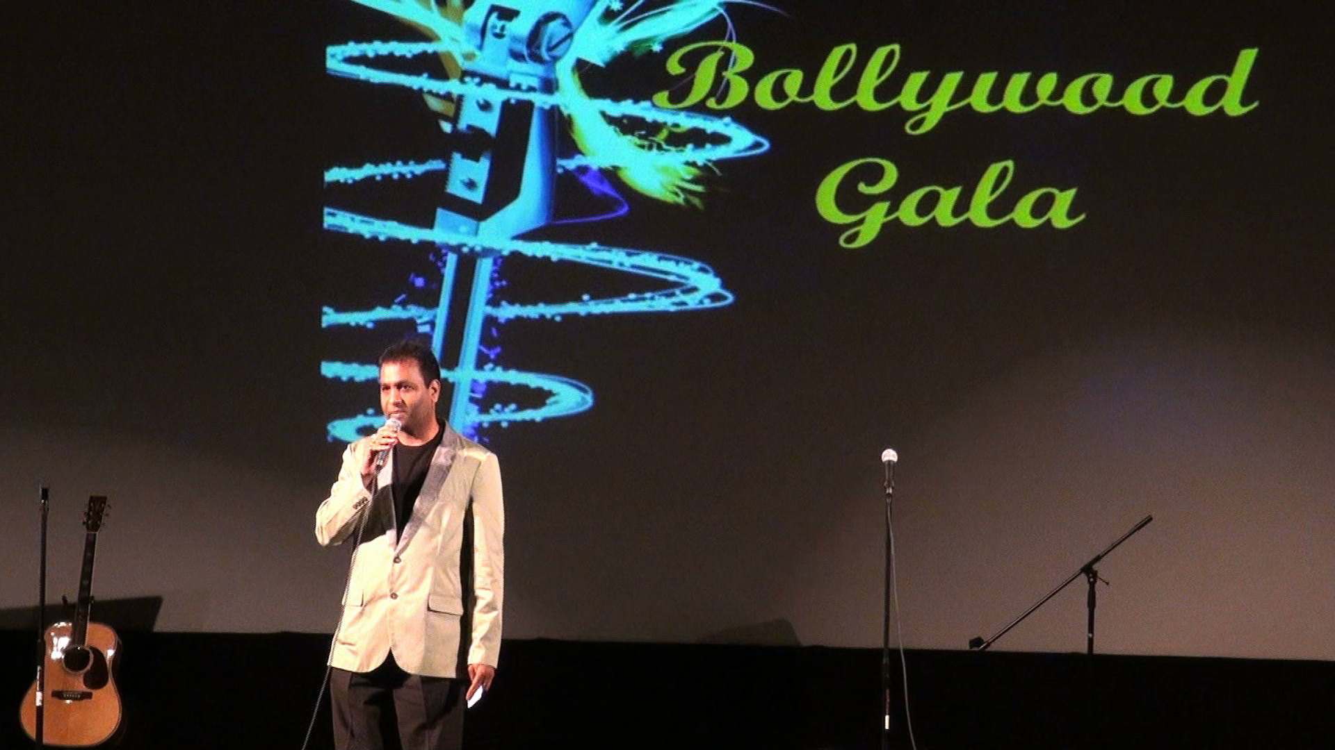 A man singing into a microphone