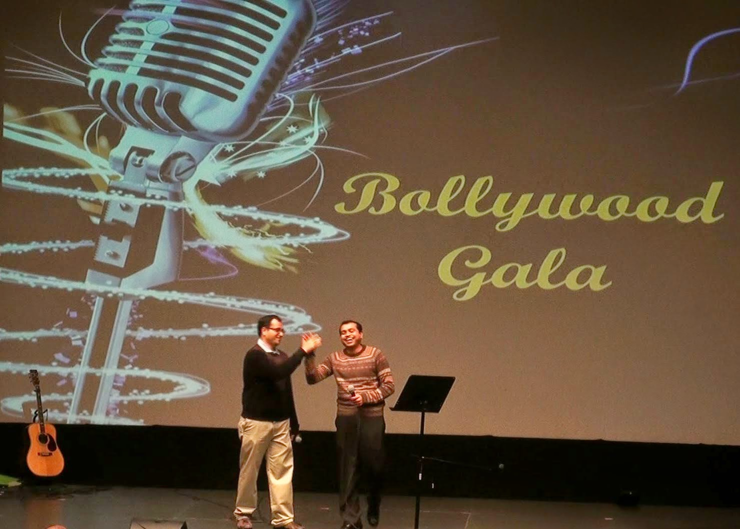 The Bollywood Gala backdrop with two performers on stage
