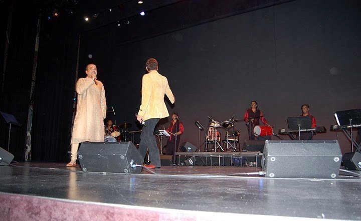 Suresh Wadkar and Aavez Darbar crossing the stage together.