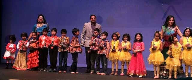 Yukta Garg New Talent Award recipients with their trophies at the 2014 ceremony.