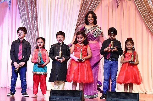 Yukta Garg New Talent Award recipients with their trophies at the 2022 ceremony.