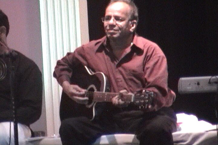 The concert’s guitarist.