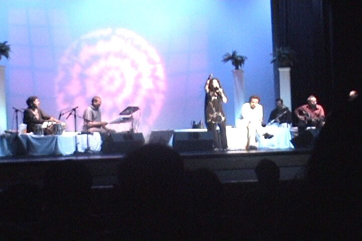 The full band on stage.