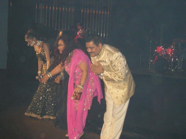 A performer bowing to the audience.