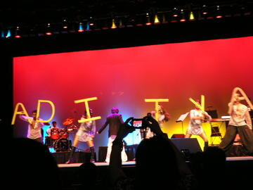 The stage set for the evening, lit up with Aditya Narayan’s name.