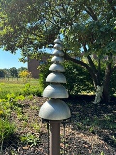Bell and chime sculpture in the Nature Sounds area of the Butterfly Playground