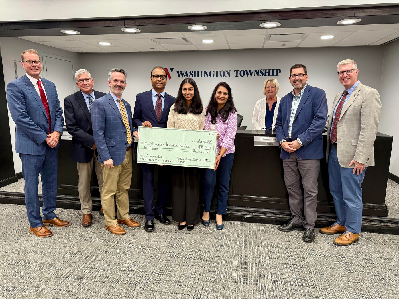 Hemant and Arti Garg presenting the 2025 check to the Washington Township Trustees